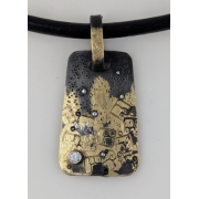 18K Gold on Blackened Steel